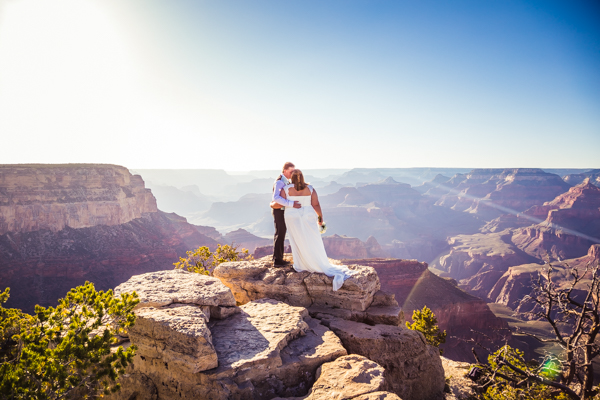 grand canyon wedding bride and groom standing on overlook
