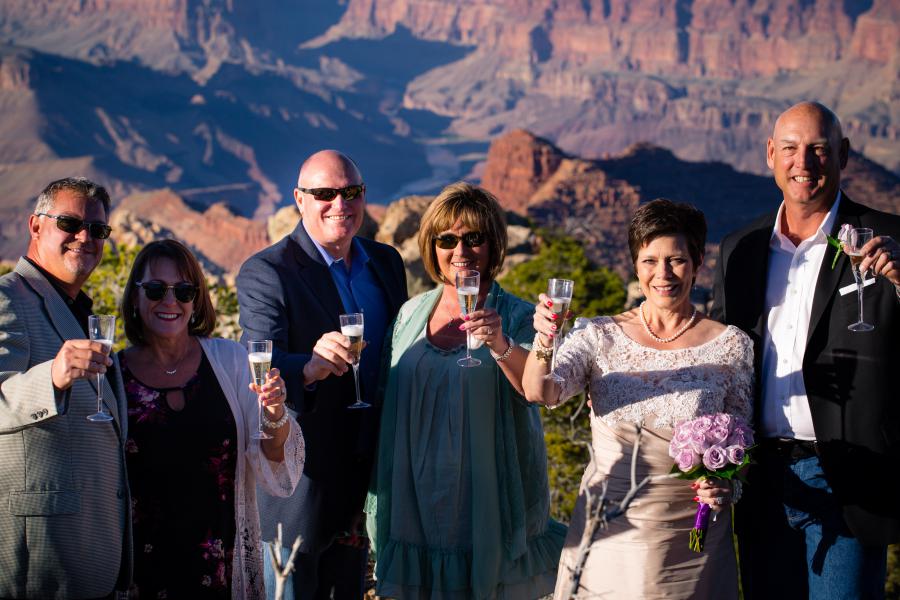 grand canyon wedding champagne toast with friends