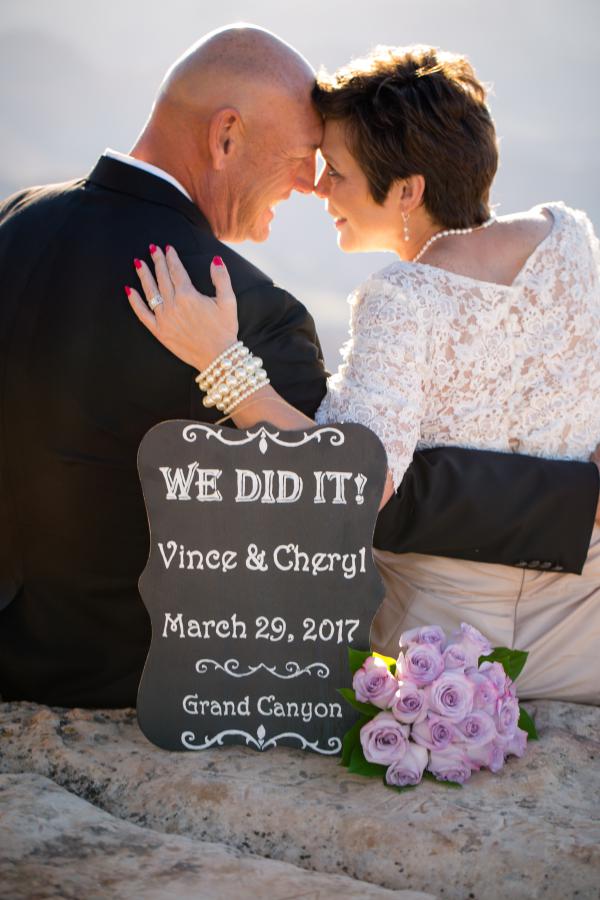 grand canyon wedding bride and groom with we did it sign