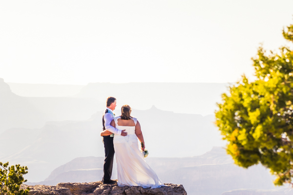 grand canyon wedding bride and groom standing on lipan point